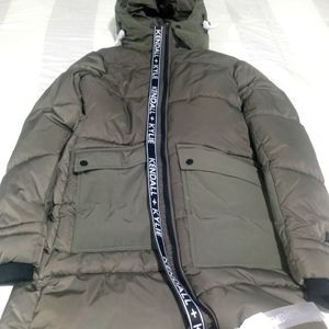 Brand new Kendall & Kyle winter goose coat for women in a size XL.